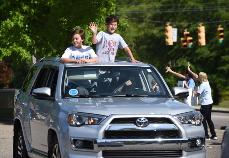 Teachers hold parade for students at Houston Academy